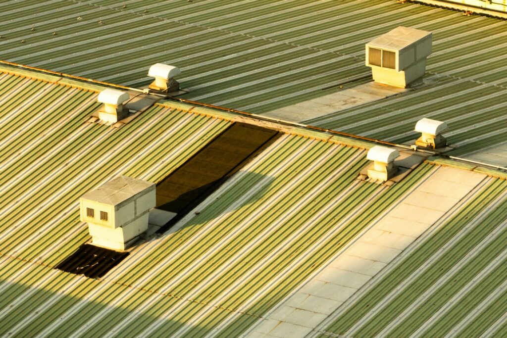Ventilation units on a commercial metal roof