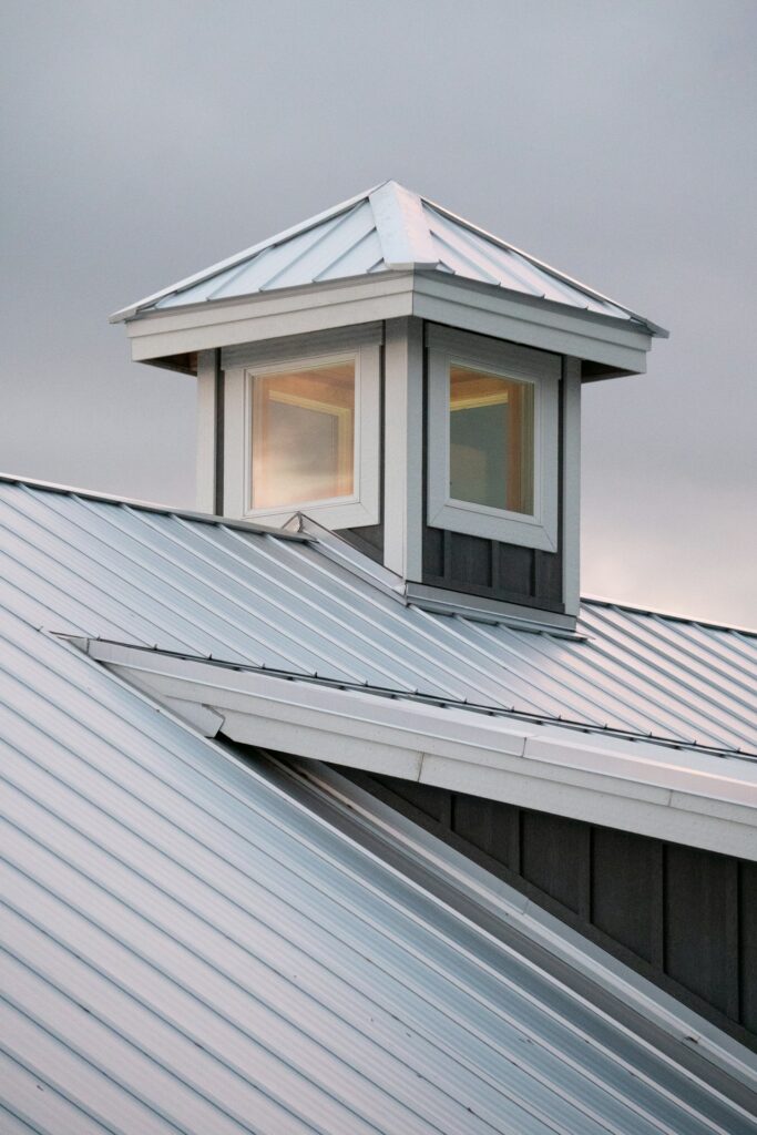 Metal roof with cupola